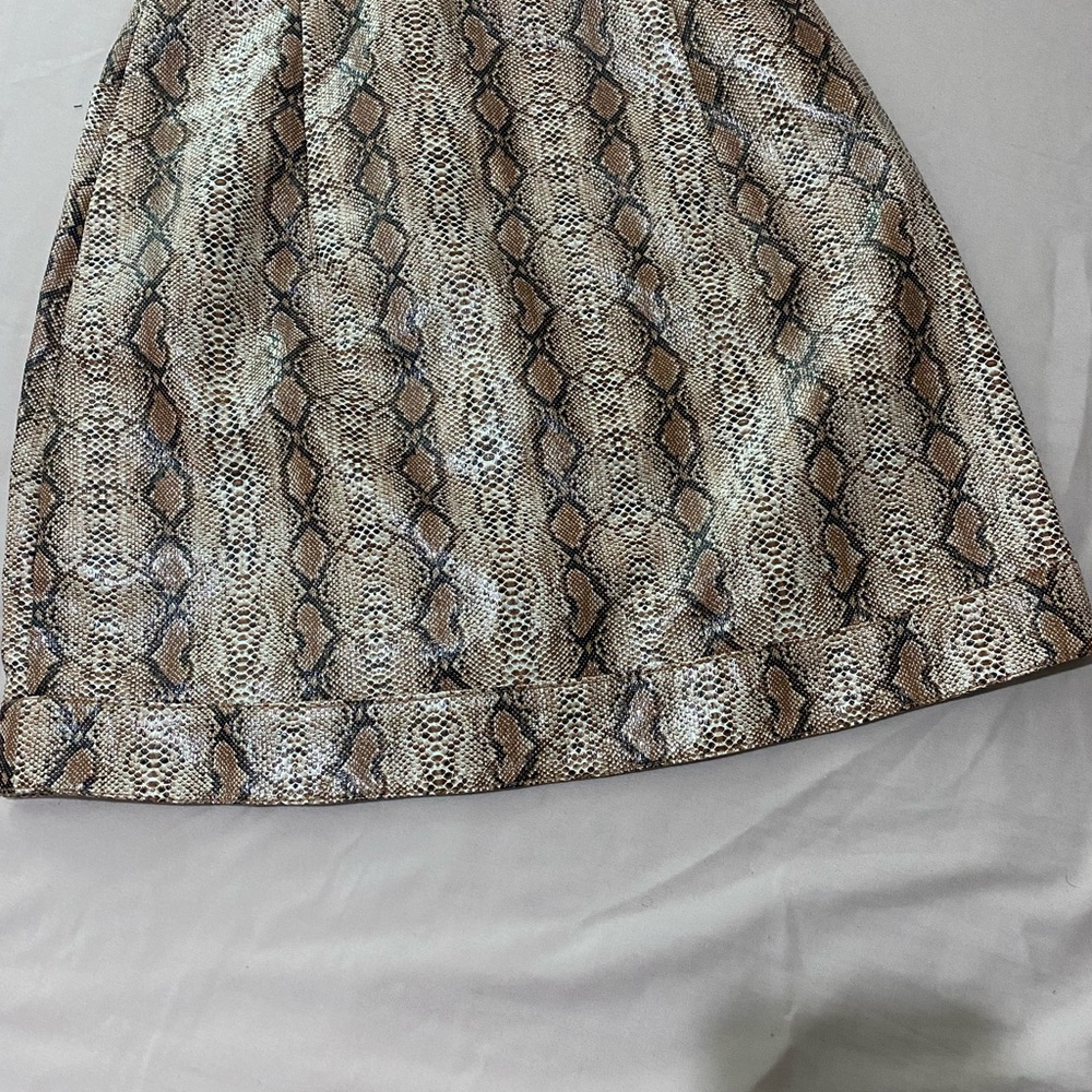 Python Mini Skirt With Pockets And Snap Buttons - image 2